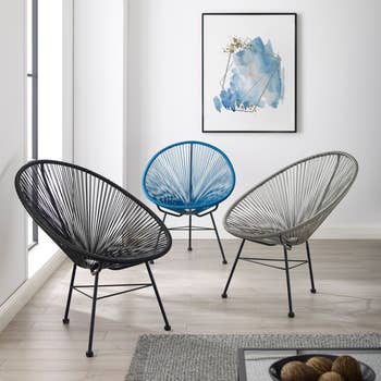 Image of three black, gray, and blue chairs