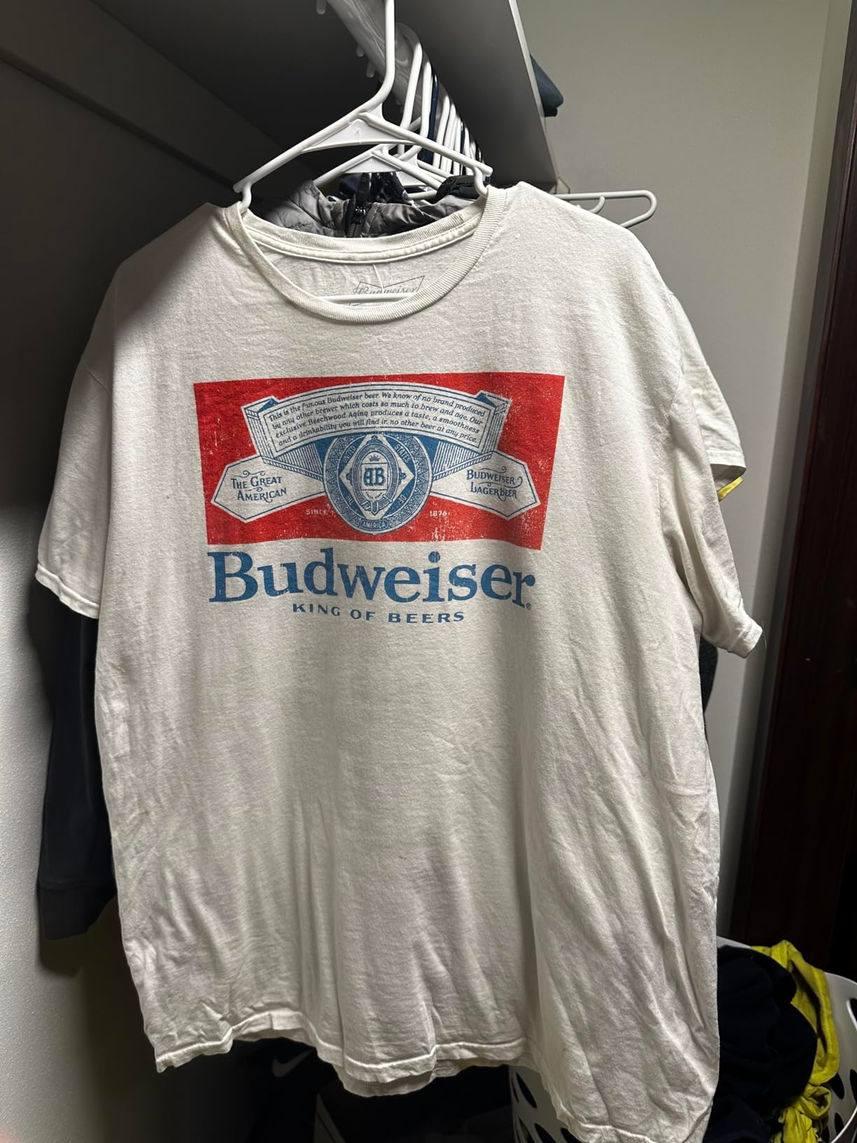 same shirt hanging, less wrinkled after using product