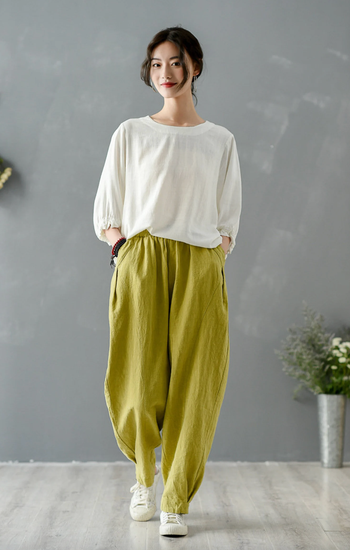 model wearing lime green linen jogger pants