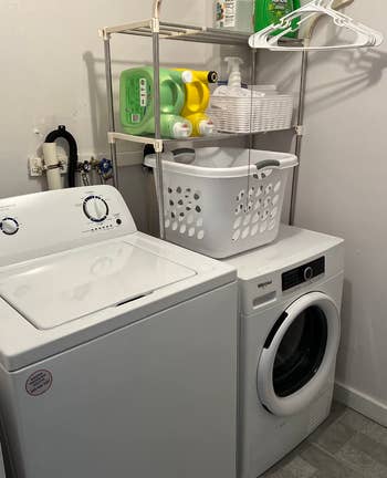 another reviewer photo of the rack holding detergent and hangers