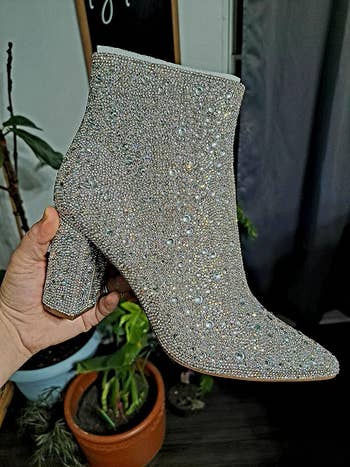 a reviewer's silver sparkly ankle boots