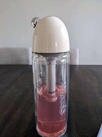 the sparkling water maker on a table