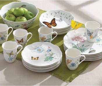Dinnerware set with butterfly and floral designs 