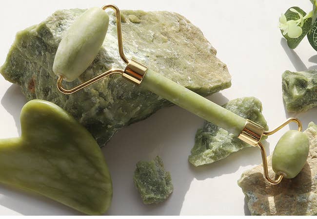 the green jade roller and gua sha tool
