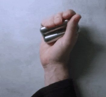 Model demonstrating how the two cylinder stainless steel roller can be fidgeted with one hand or two 