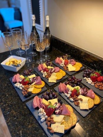 reviewer's spread where everyone gets their own mini charcuterie board