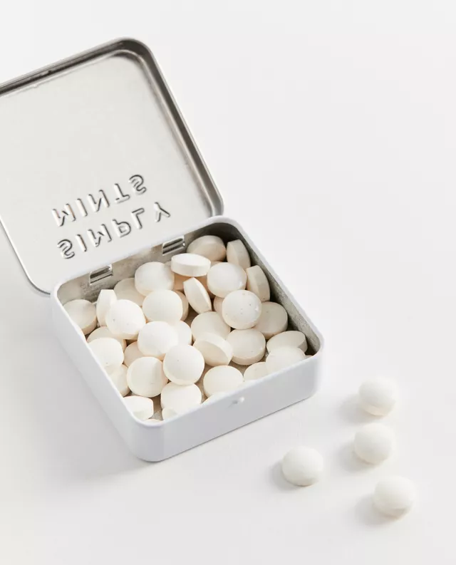 metal tin filled with mints