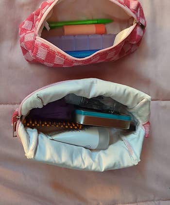 reviewer photo of the pink checkered bags open to show their contents