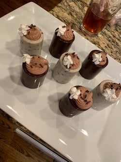 chocolate shot glasses made with the mold with dessert inside