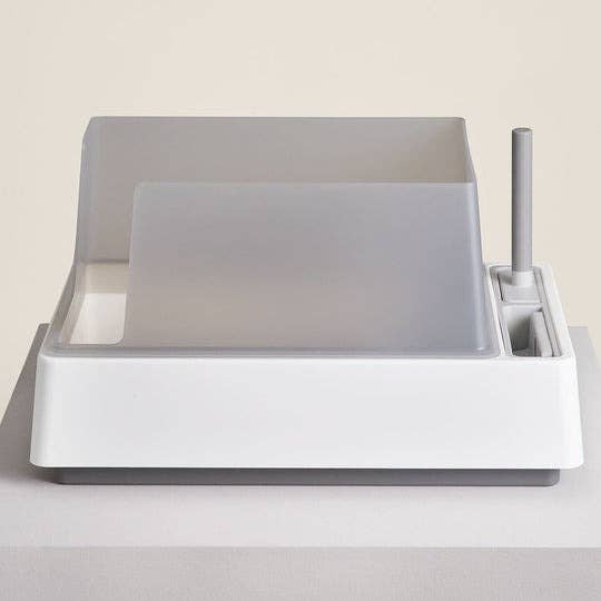 Modern minimalist dish rack with drying mat and utensil holder