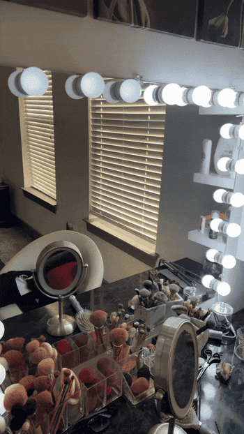 gif of Jordan Grigsby's vanity mirror with lights fading and getting brighter
