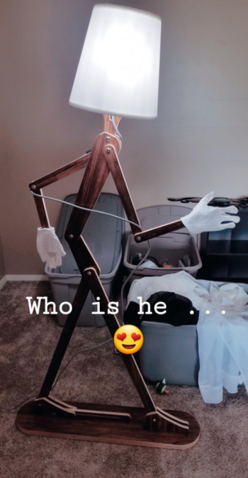 reviewer pic of the lamp posing like it's walking