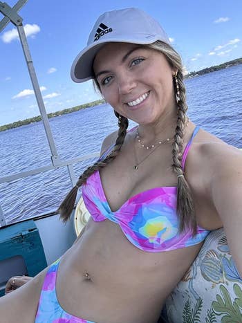 reviewer wearing the pink bikini top