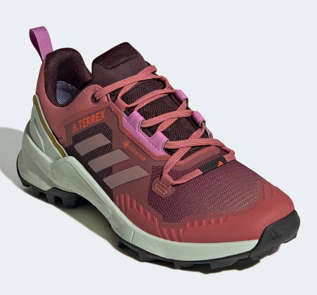 the red and pink adidas hiking shoe