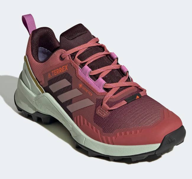the red and pink adidas hiking shoe