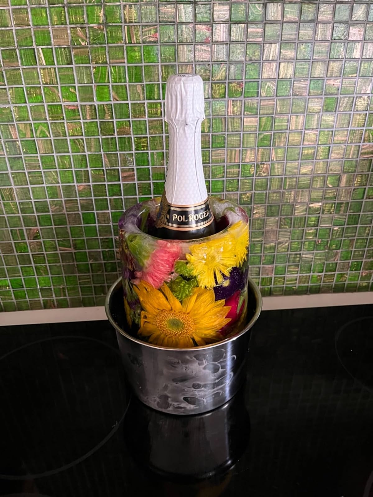 Champagne vessel  successful  an crystal  bucket decorated with embedded flowers, connected  a tiled surface