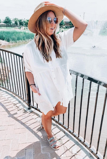Reviewer wearing white coverup