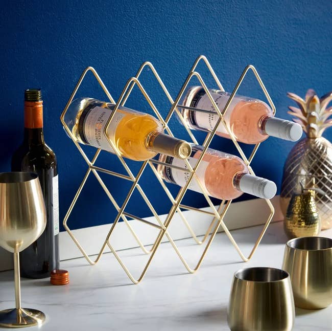 Image of gold wine rack