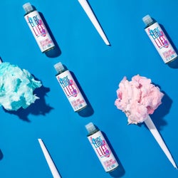Cotton candy lubricant surrounded by cotton candy