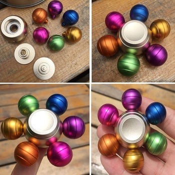 the toy taken apart and with the colorful balls on the side arranged in different orders