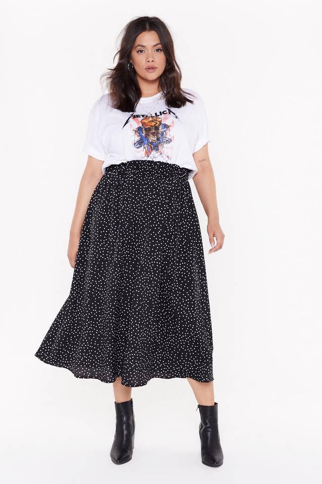 model wearing the black and white polka dot skirt