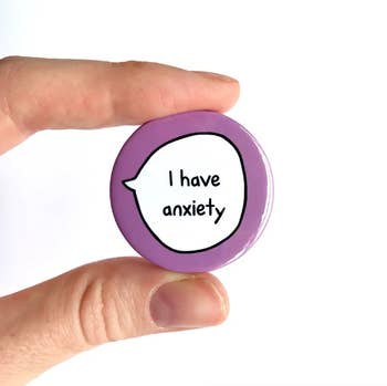 a purple pin that says 