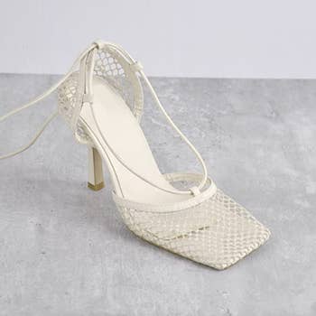 A white mesh sandaled heel 