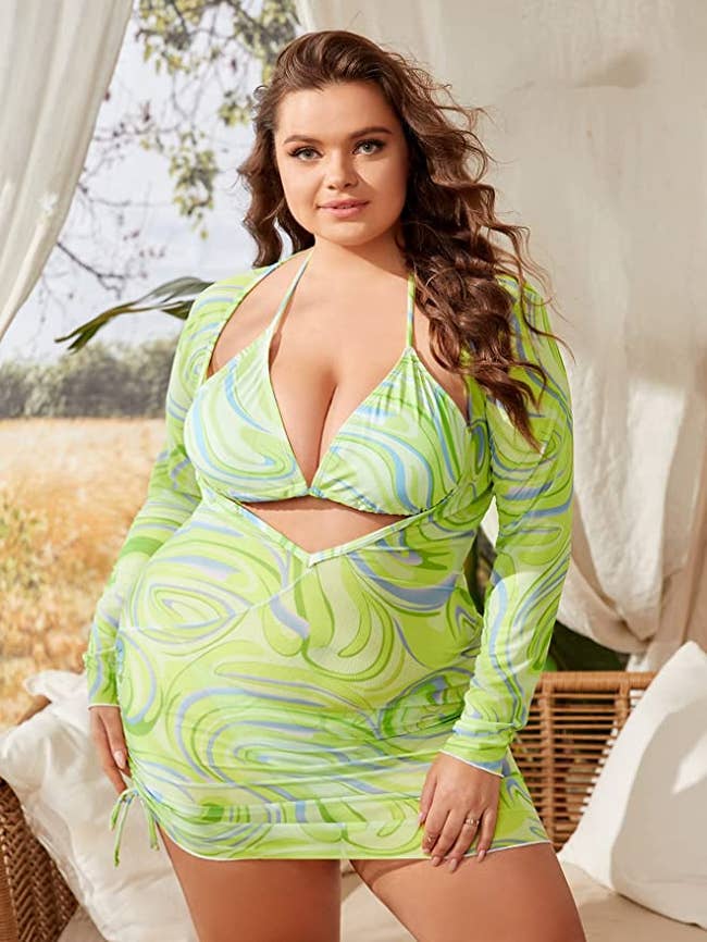 model in swirl print coverup and matching bikini