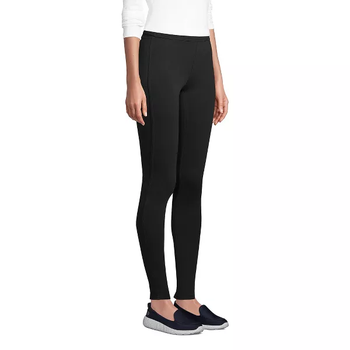 Model in black high waisted leggings 