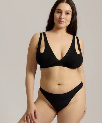 model modeling a minimalist bikini successful  a buying  catalog