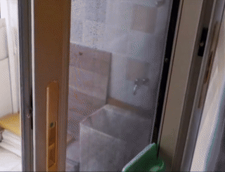 GIF of exemplary  utilizing cleaner to cleanable  doorway  screens