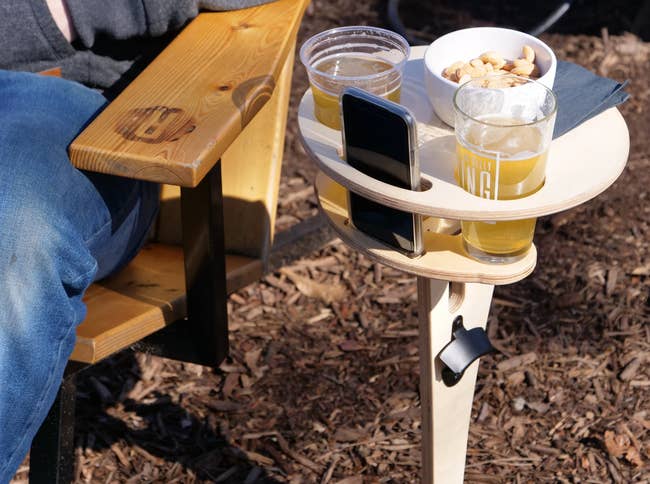 portable table with beer, phone, and snack bowl