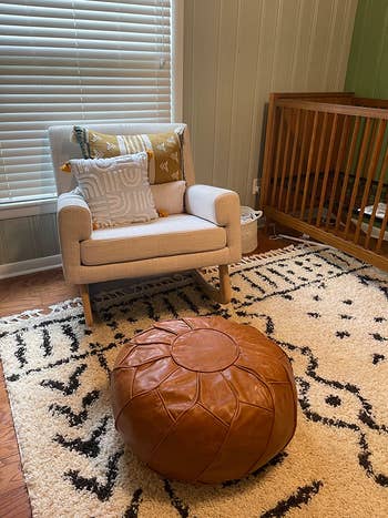 reviewer photo of faux leather ottoman