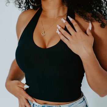 Daily News | Online News model in black halter top