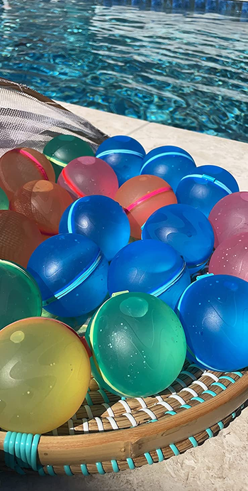 A reviewer's set of 20 balloons by a pool