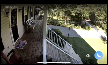 Screenshot of full color resolution of a porch next to calling option button taken from footage from the camera