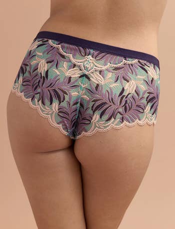 model showing the back of the lace cheeky underwear