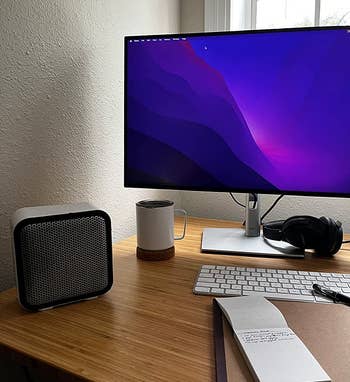 reviewer's white space heater on a desk next to a computer