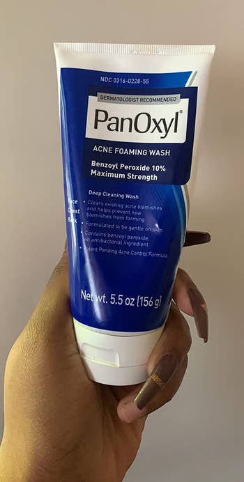 Reviewer holding their PanOxyl wash