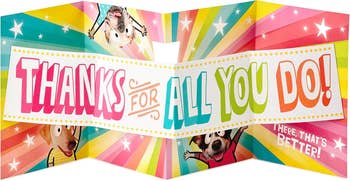 inside of pop-up card with a rainbow starburst background, reads 