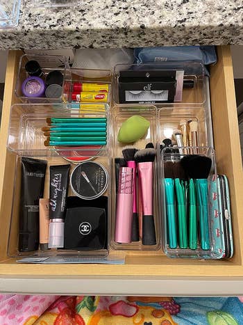 reviewer's makeup in the clear drawer organizers