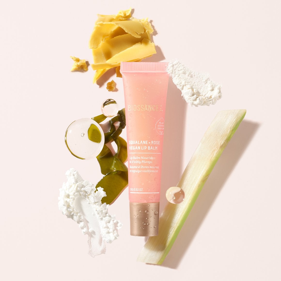 Pink and gold tube of Biossance Rose Vegan Lip Balm