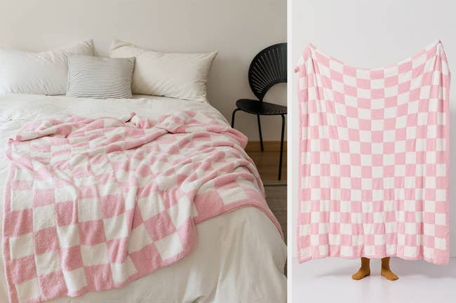 Pink and white checkered blanket sprawled on bed, model holding up product