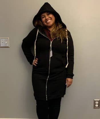 Image of reviewer wearing long black hoodie