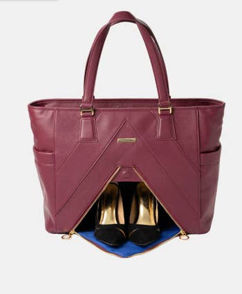 The bag with the front compartment open with a pair of heels inside it