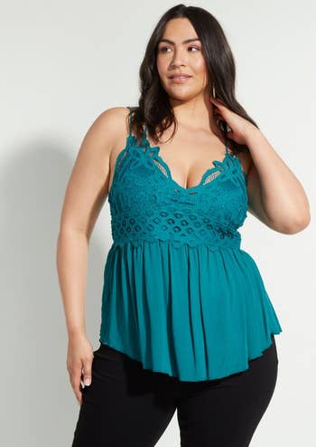 model in cami with crochet bust detail in teal