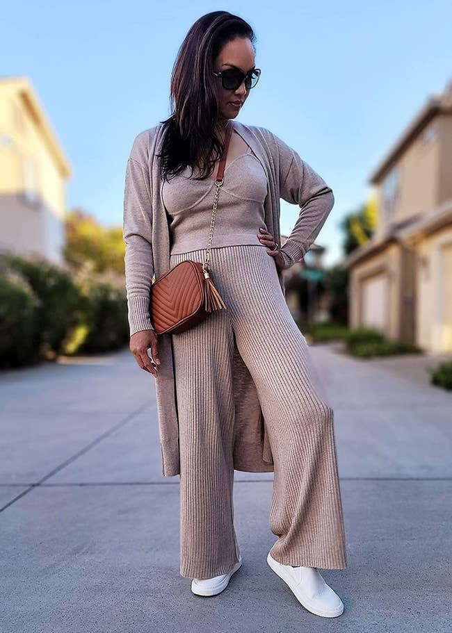reviewer wearing full three-piece knit set