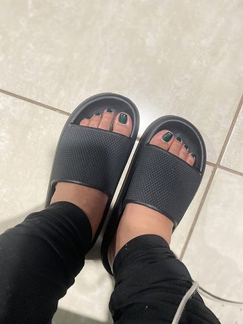 A reviewer in the black sandals