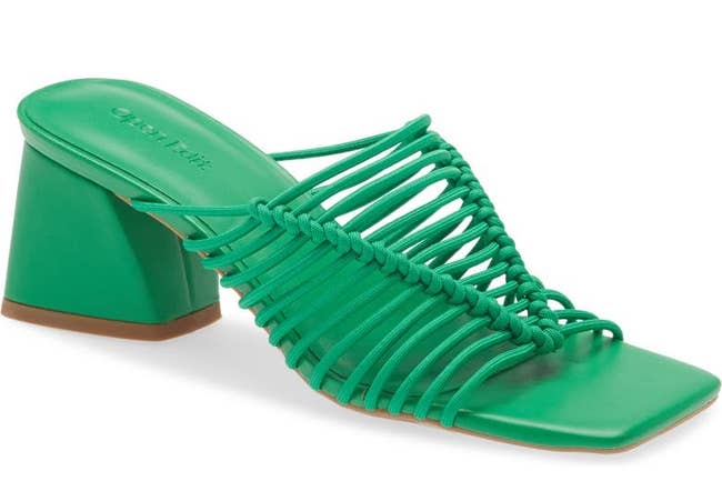 the green heeled sandal with stretchy straps across the top