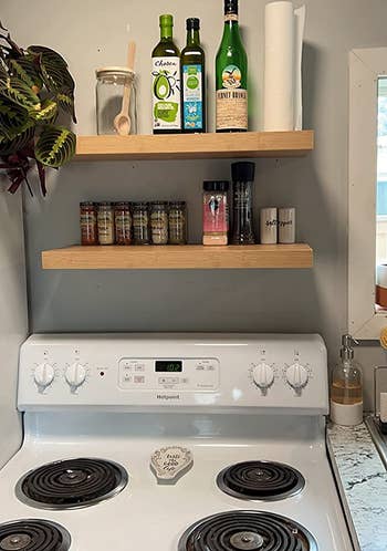 a reviewer with wood shelves in their kitchen